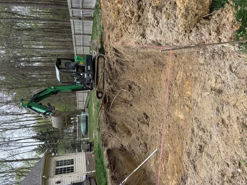 Excavation services Hampton Roads VA - mini excavator digging for pool installation